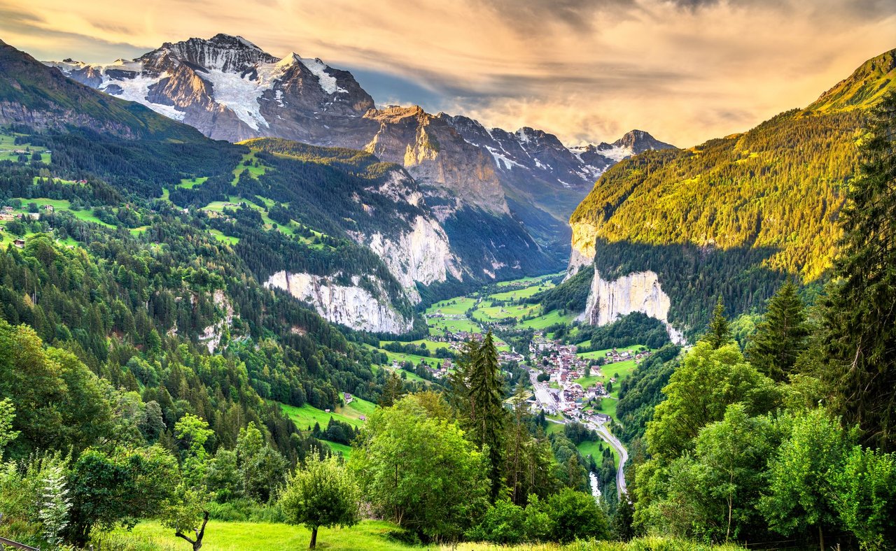 The green countryside of the Lauterbrunnen Valley in Switzerland