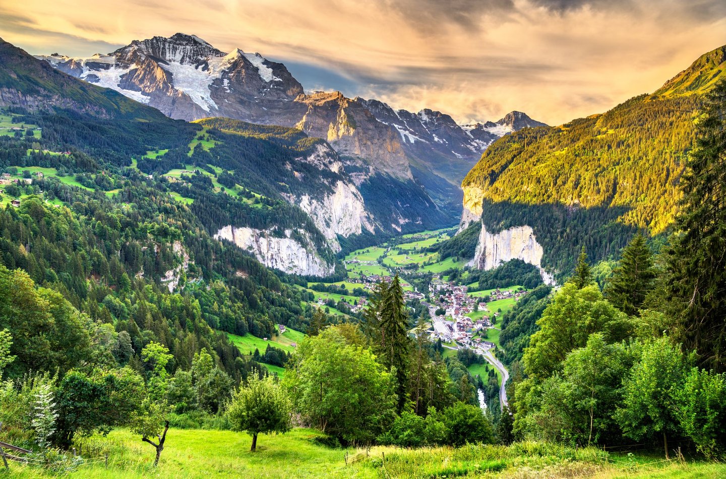 The green countryside of the Lauterbrunnen Valley in Switzerland