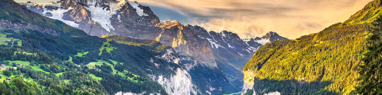 The green countryside of the Lauterbrunnen Valley in Switzerland