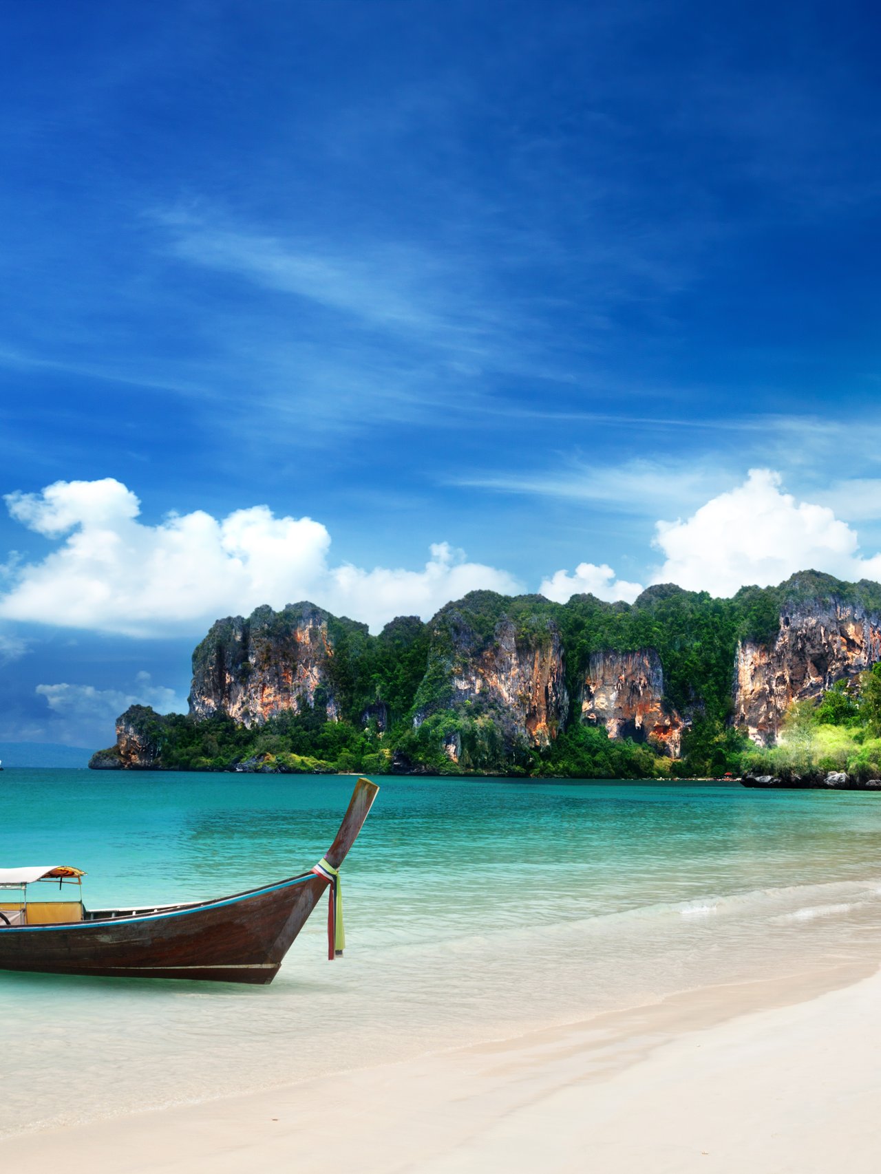 A long boat on Railay Beach in Krabi, Thailand.