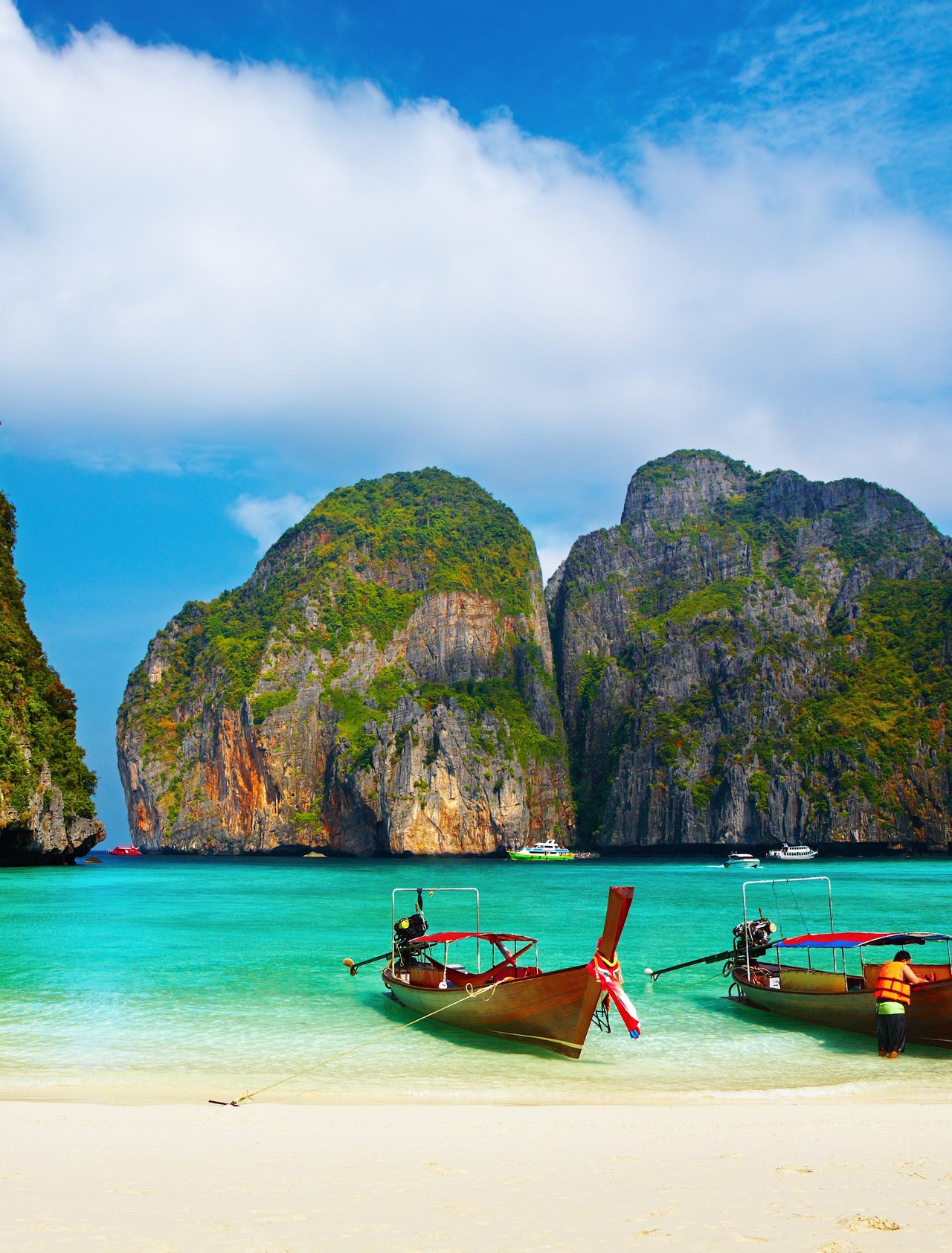 Long boats on the beach at Maya Bay in Thailand