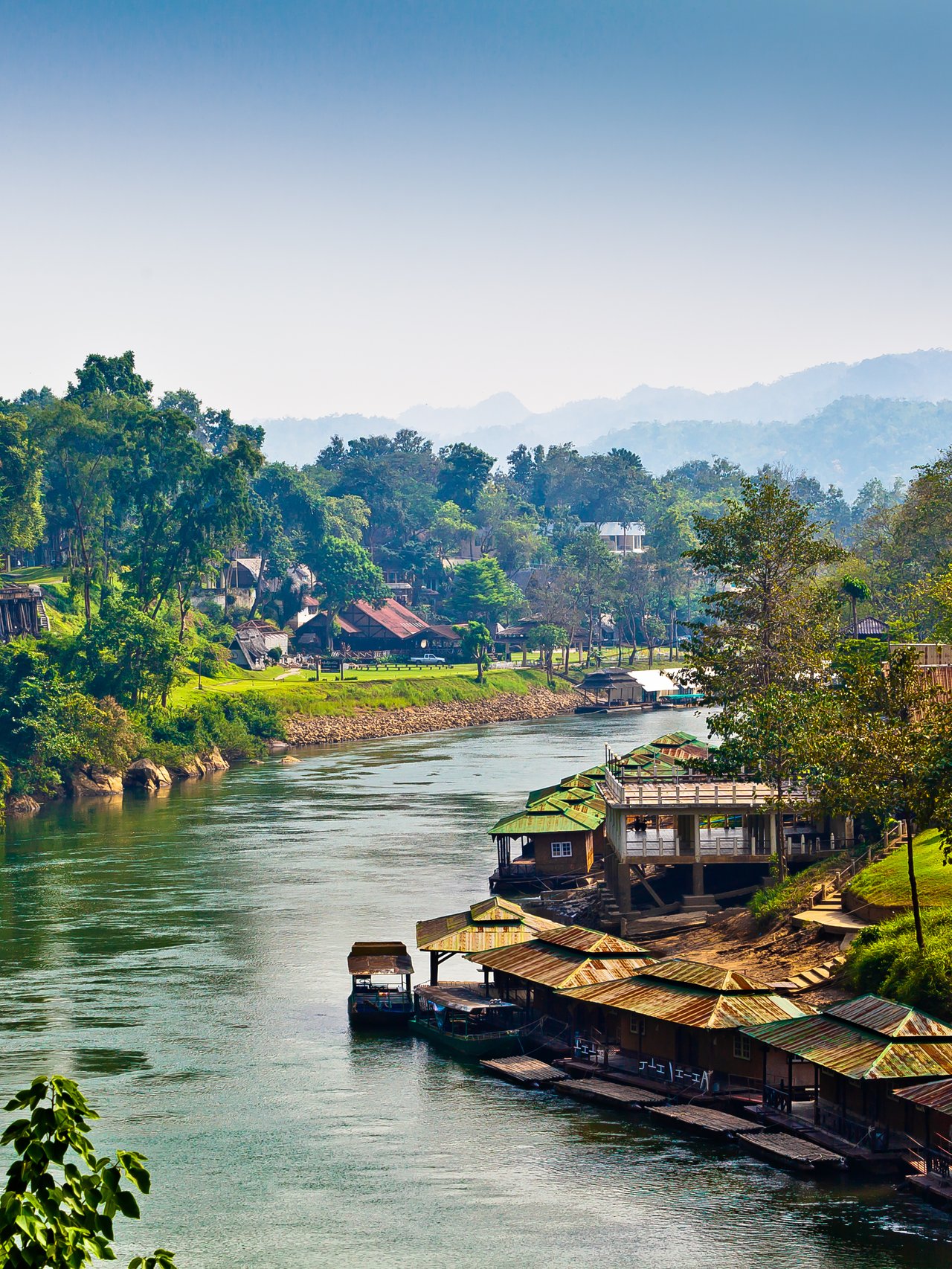 Houses lining the River Kwai in Thailand.