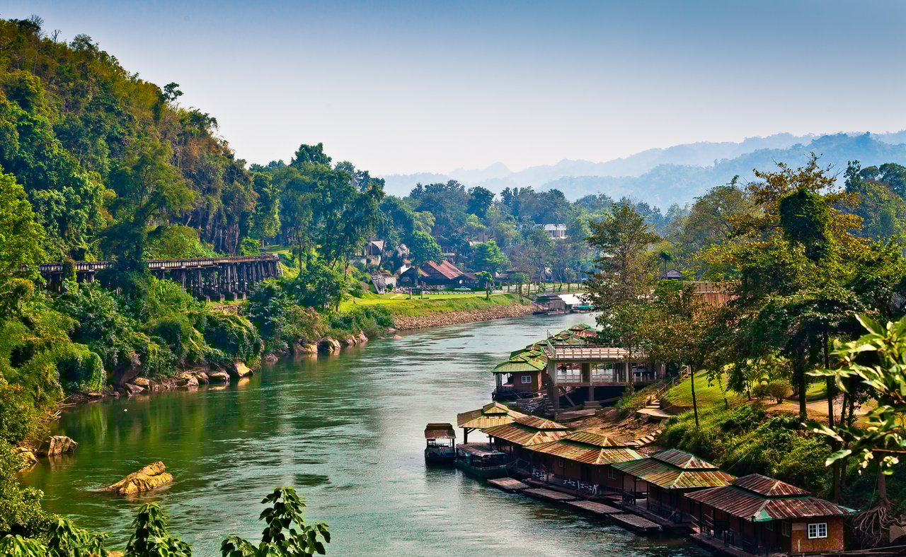 Houses lining the River Kwai in Thailand.