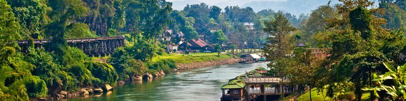 Houses lining the River Kwai in Thailand.