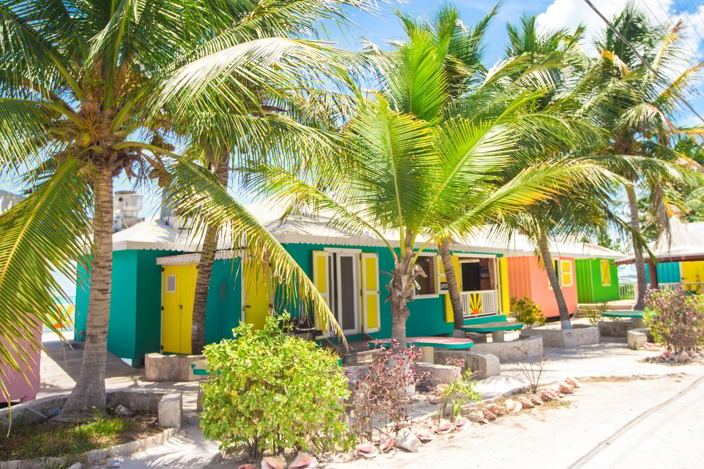 Colourful beach huts in Turks and Caicos