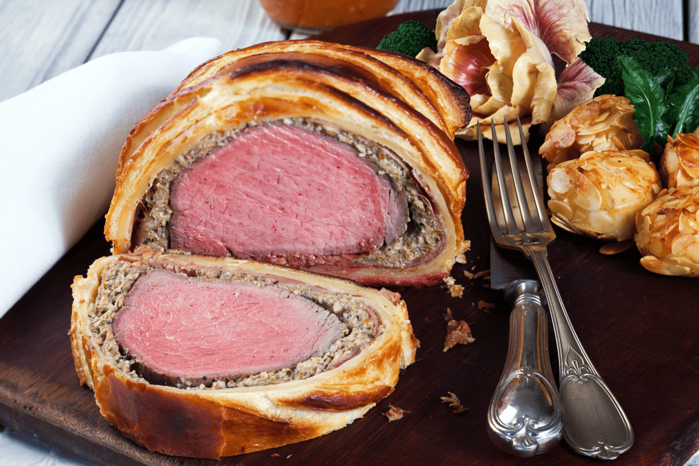 Beef Wellington on cutting board