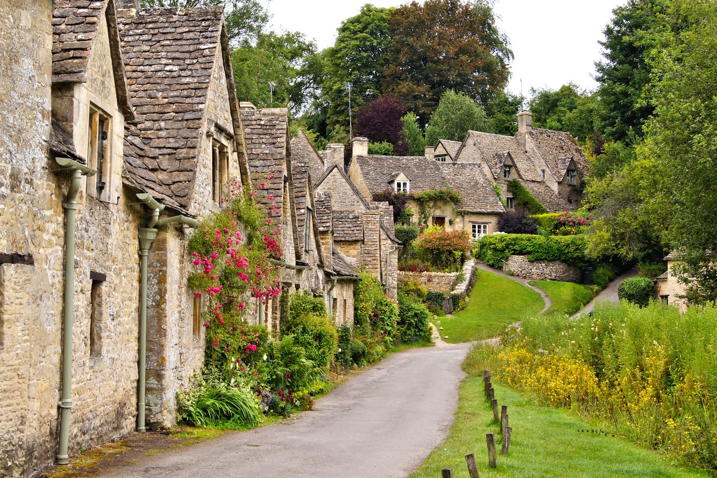 Picturesque old stone houses of Arlington Row in the village of Bibury, Cotswolds, England