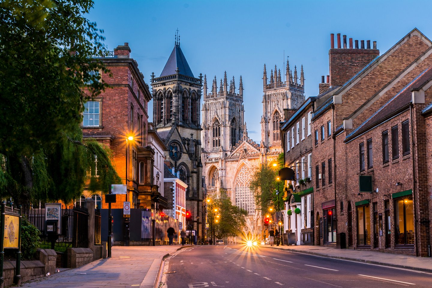 A street in York at night with the church in the background