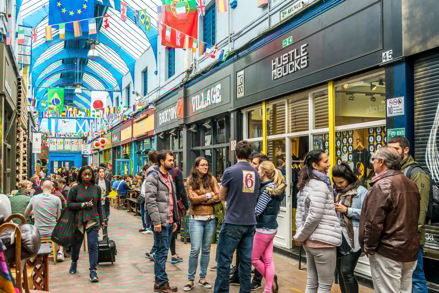 People gathering at Brixton Village and Brixton  Market.. 