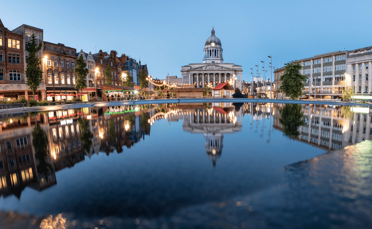 Nottingham city hall in the Old Market Square with a pool and fountain in the foreground