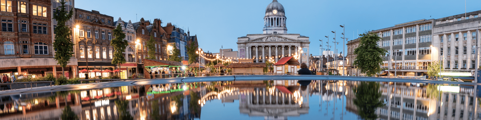 Nottingham city hall in the Old Market Square with a pool and fountain in the foreground