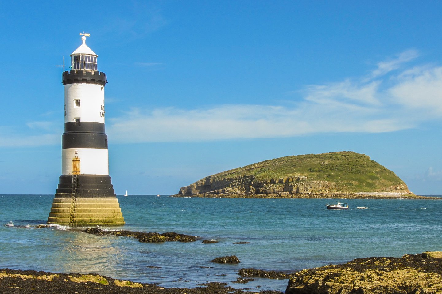 Lighthouse with Puffin Island in the background