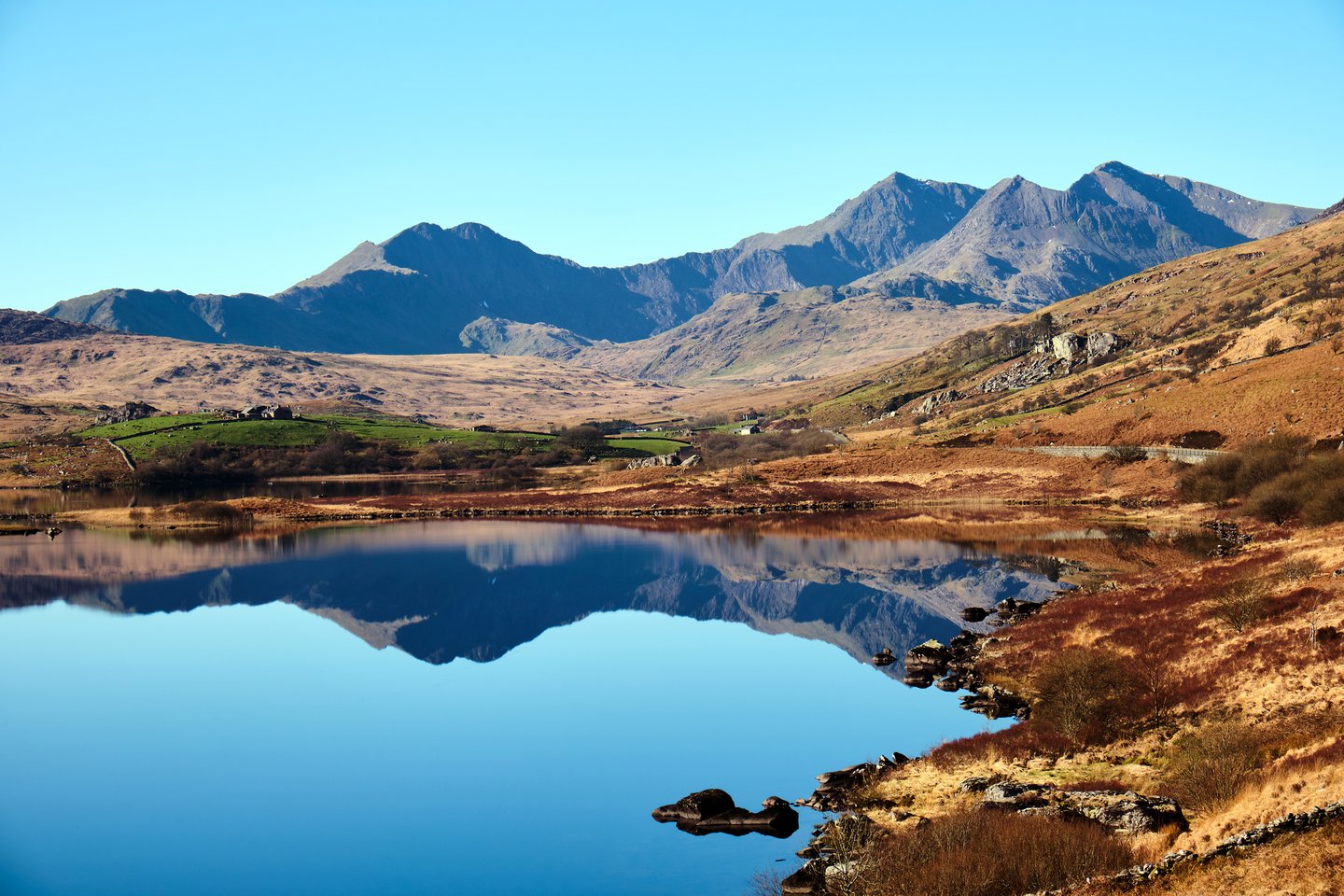 Mount Snowdon and its reflection in Llynnau Lake in Snowdonia National Park, Wales