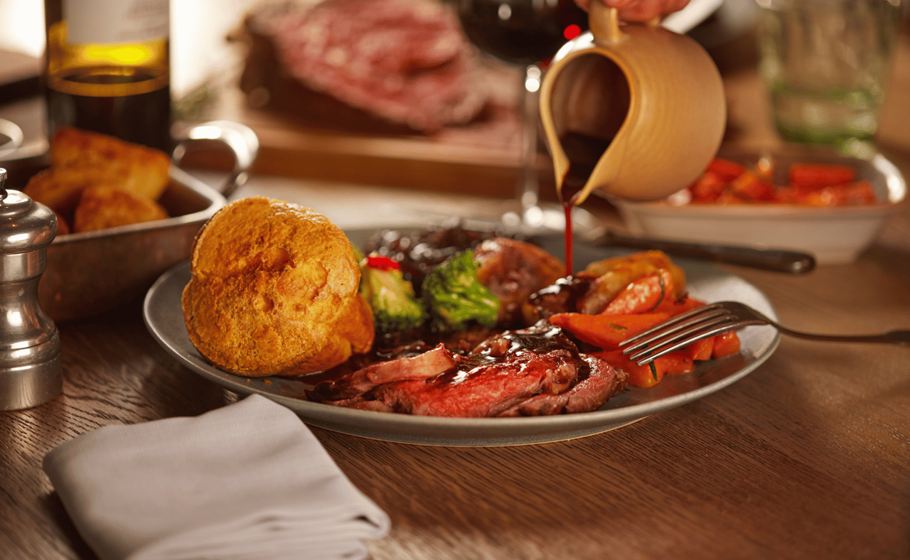 A dish with traditional beef roast with gravy