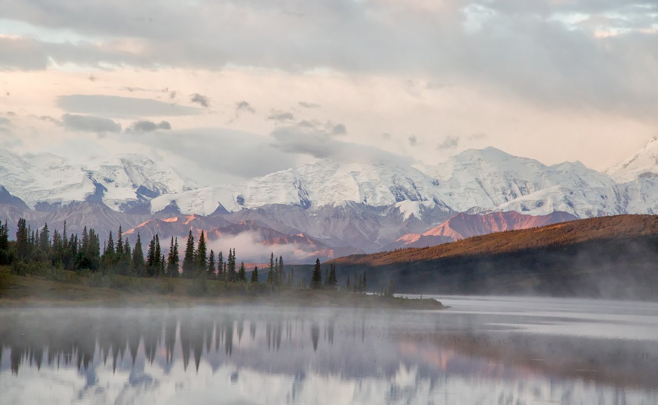 Snowy mountains and morning fog at Denali of Mt McKinley, Alaska
