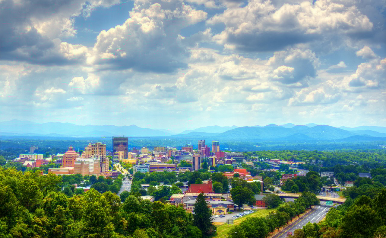 The Asheville skyline with the mountains in the background