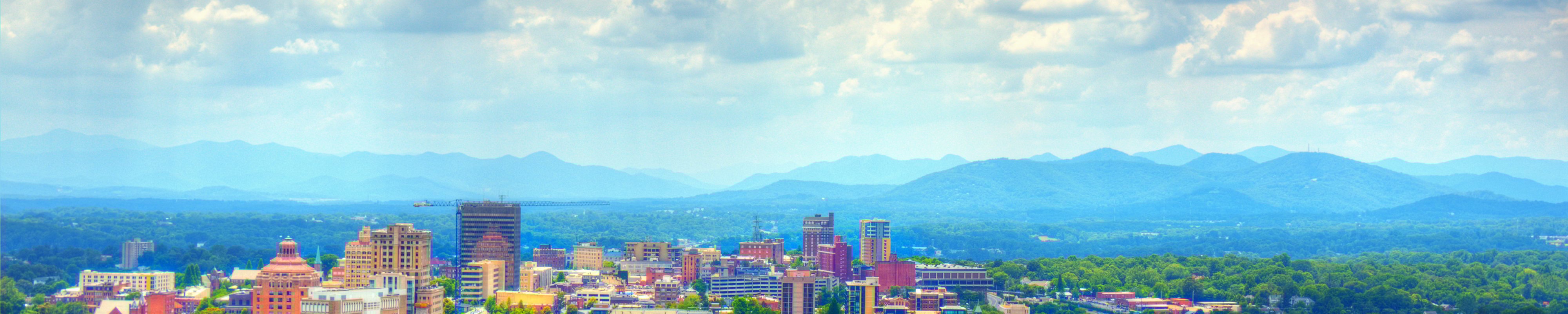 The Asheville skyline with the mountains in the background