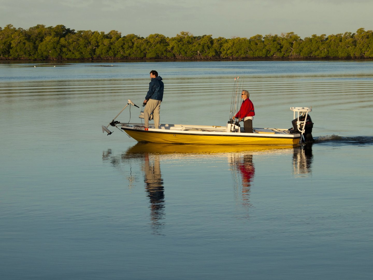 Fishing from a bat in Naples, Florida