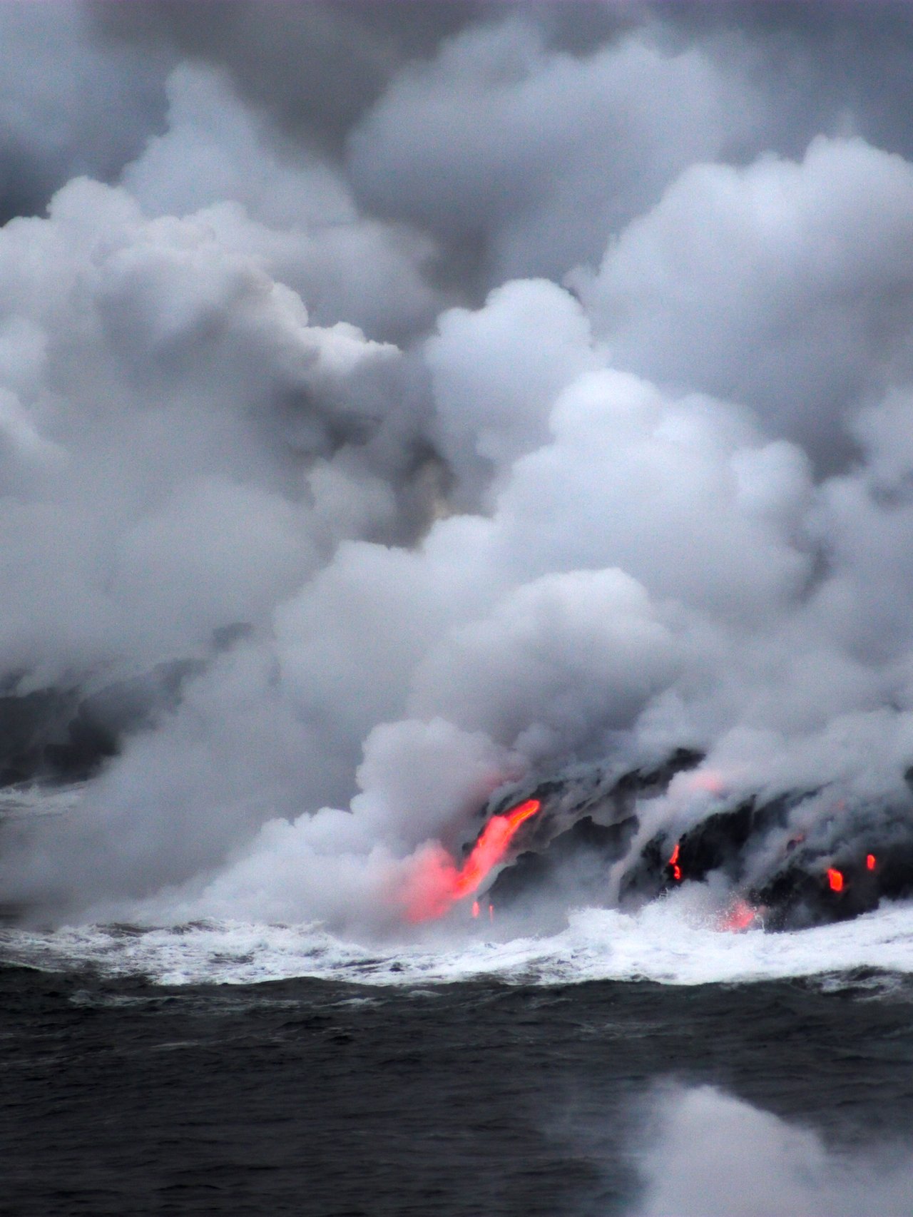 Lava flowing into the ocean in Hawaii