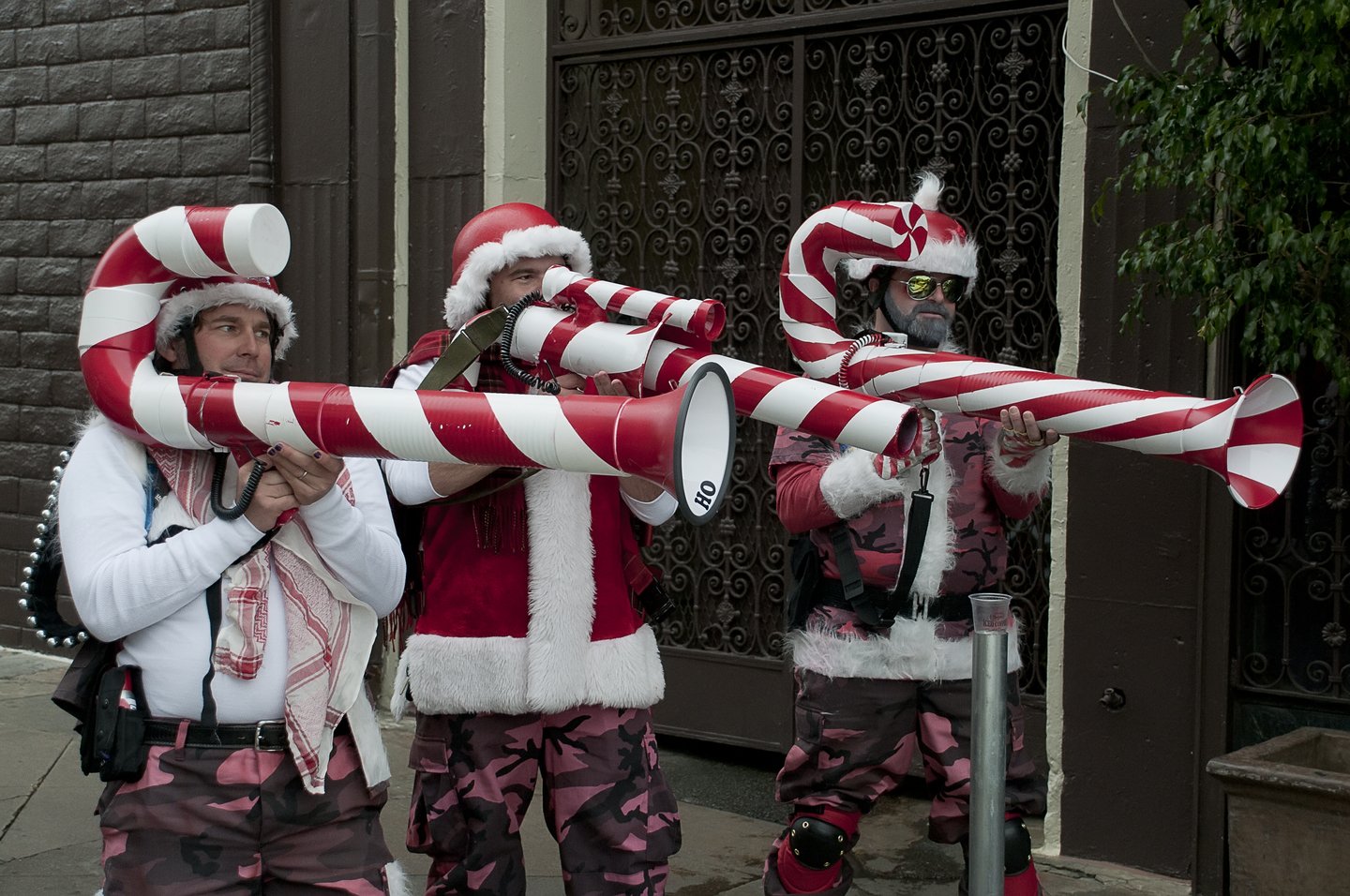 Performers playing candy-cane striped horns at the Hollywood Christmas Parade.