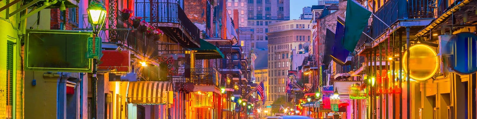 Pubs and bars with neon lights in the French Quarter, New Orleans USA