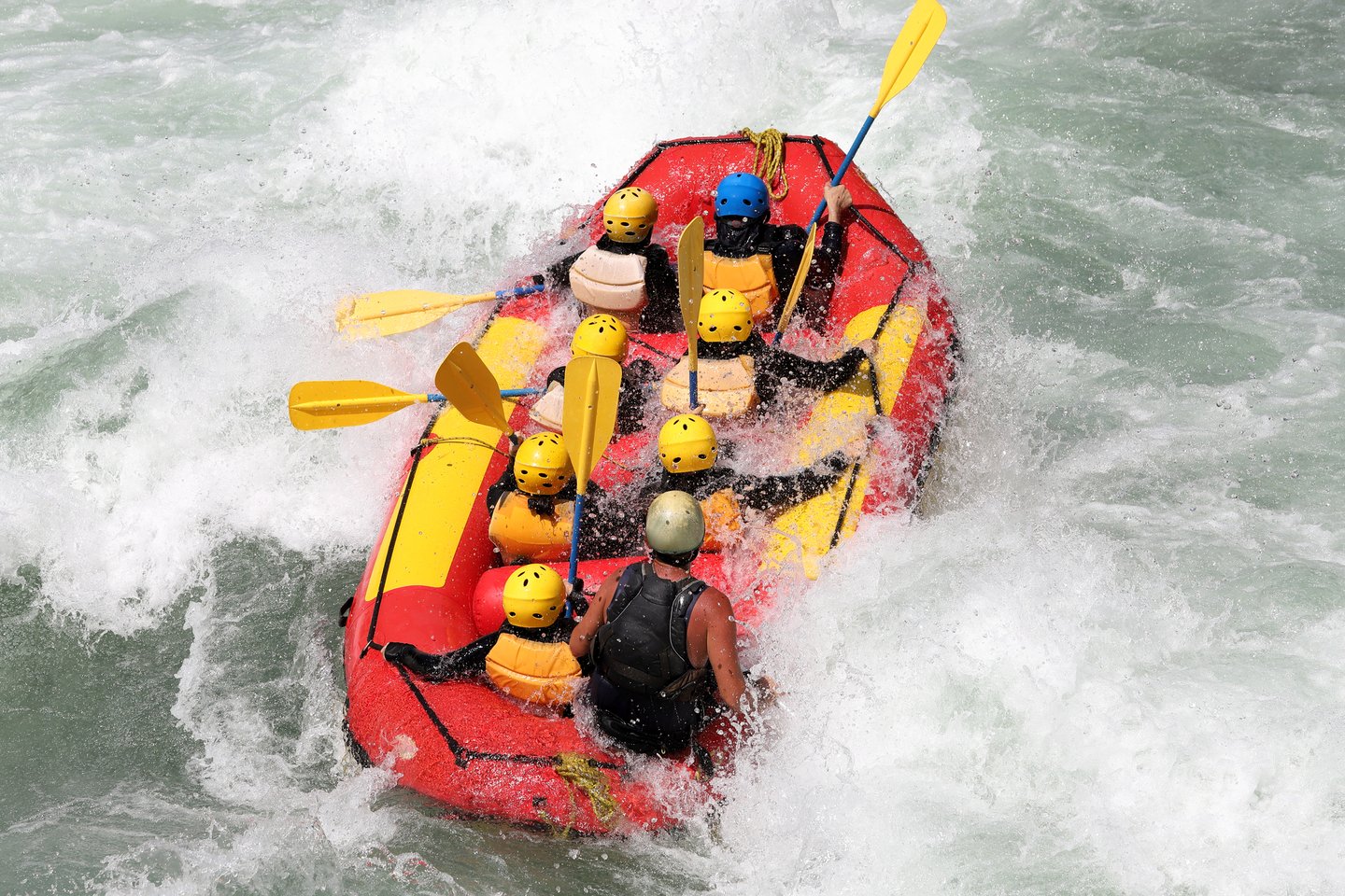 A group white water rafting