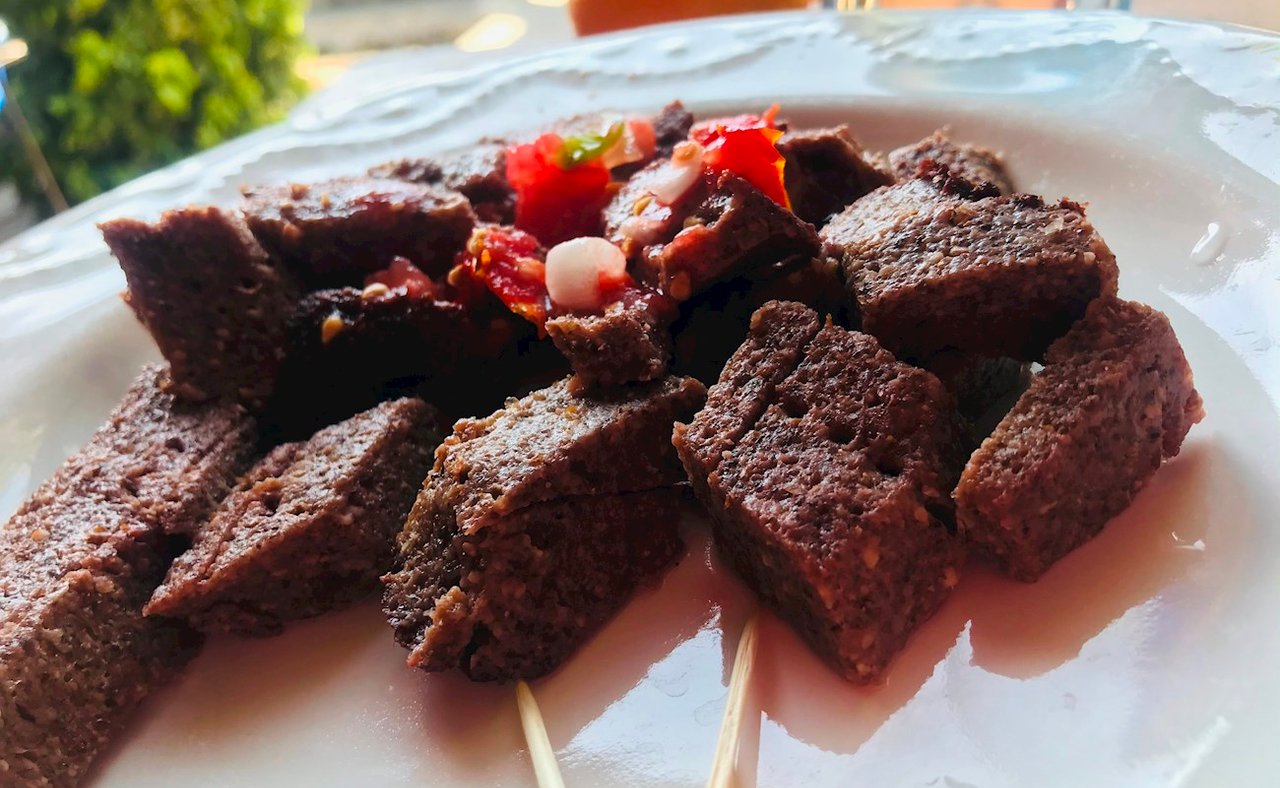 Cubes of chikanda served as snack with chilli