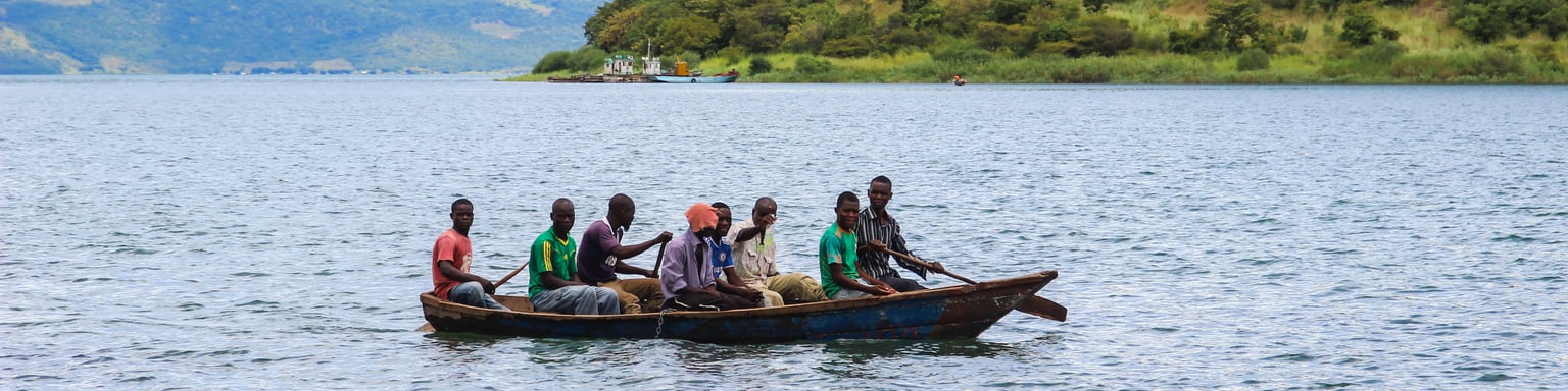 People on a boat on Lake Tanganyika, Zambia