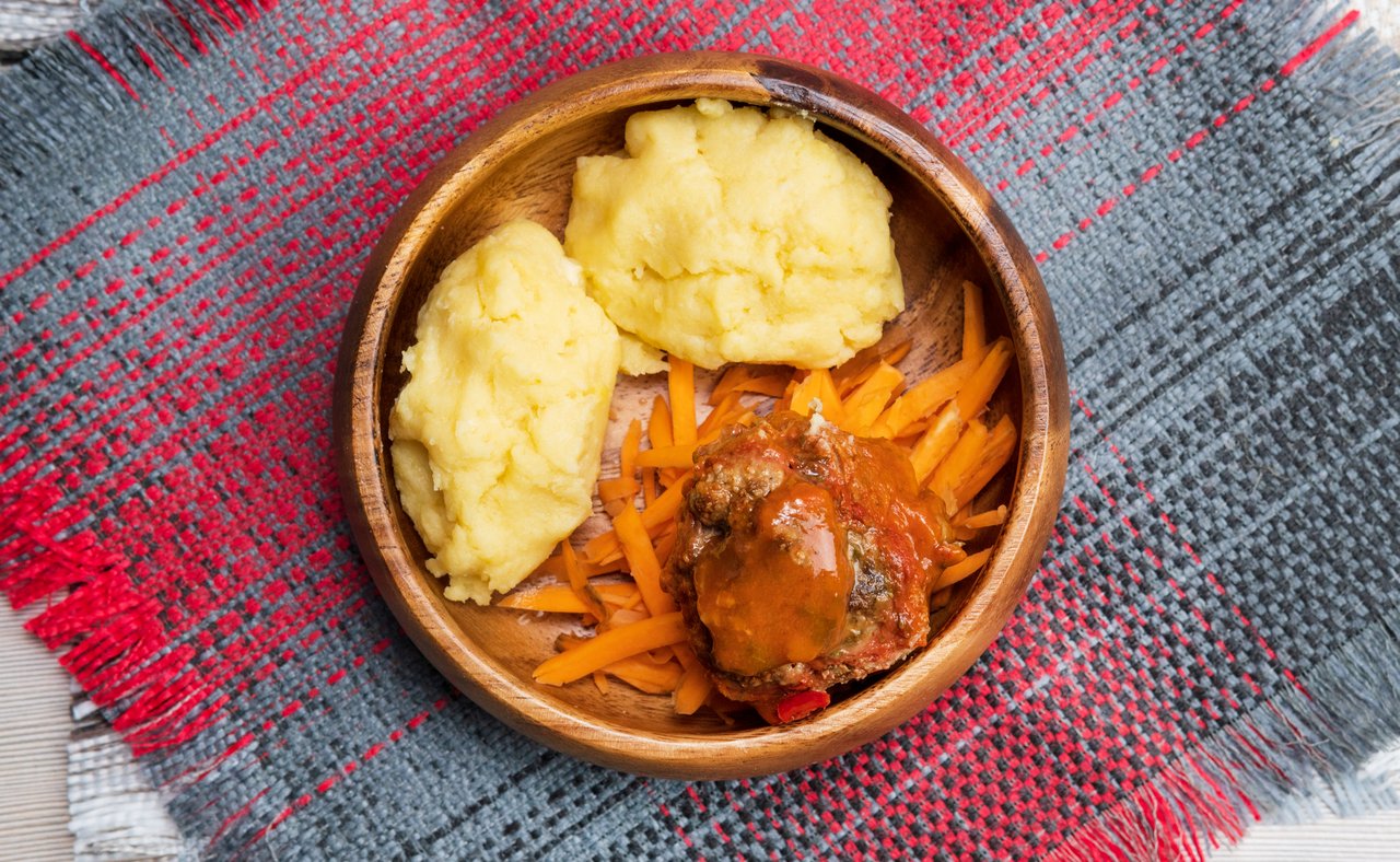 African maize porridge, nshima, with meat and sweet potatoes