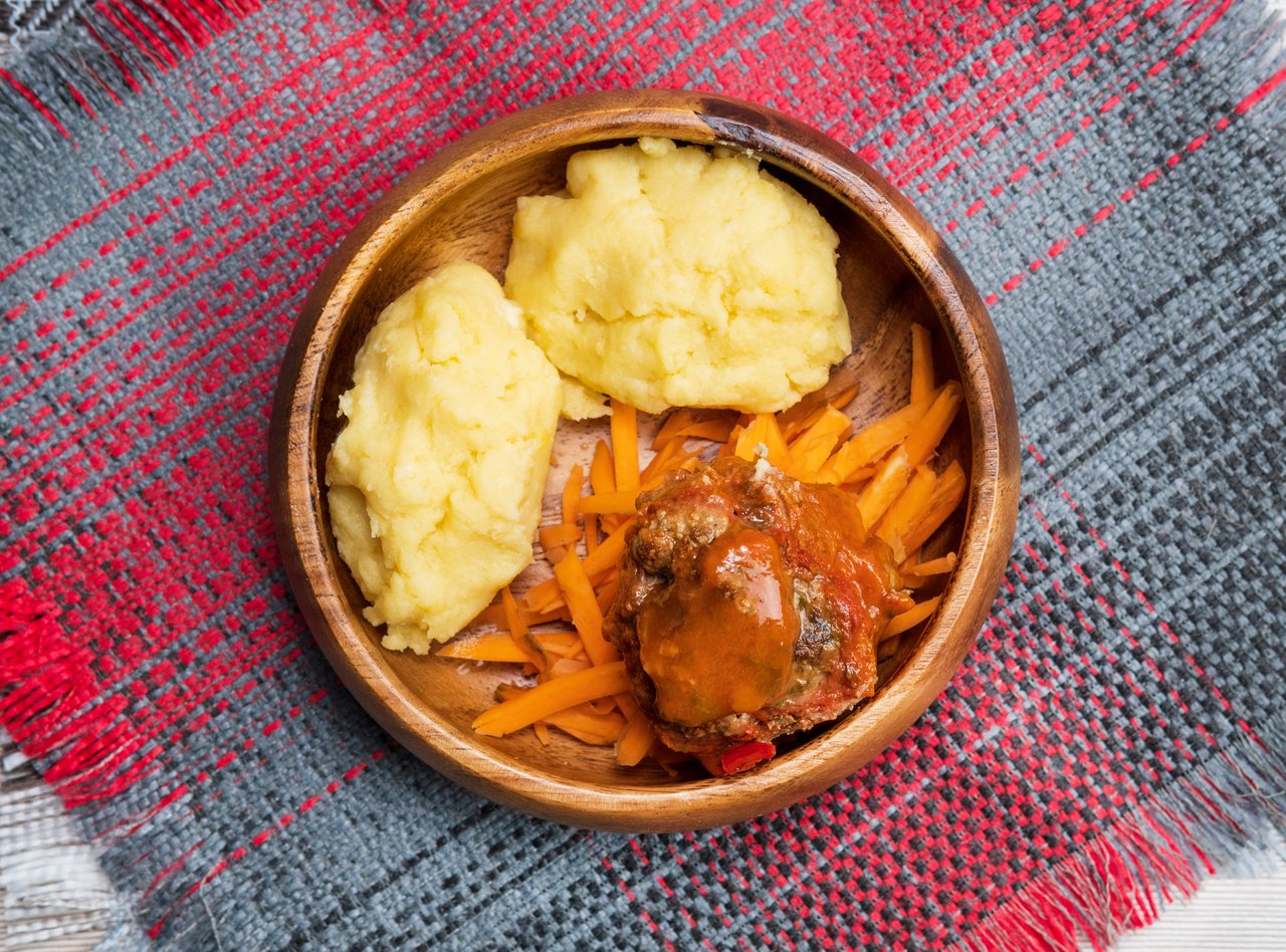 African maize porridge, nshima, with meat and sweet potatoes