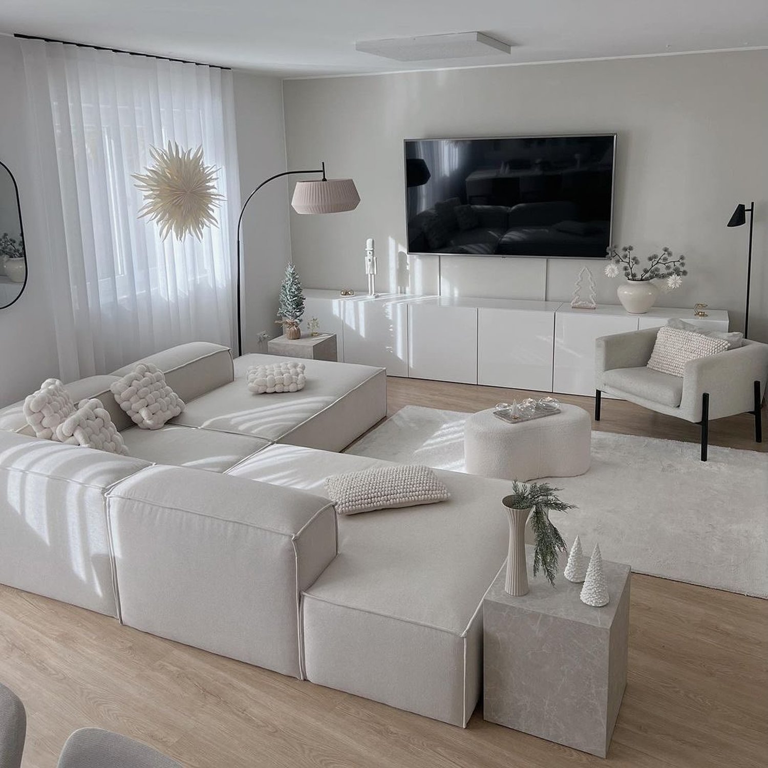 A tastefully decorated living room with a modern minimalist aesthetic