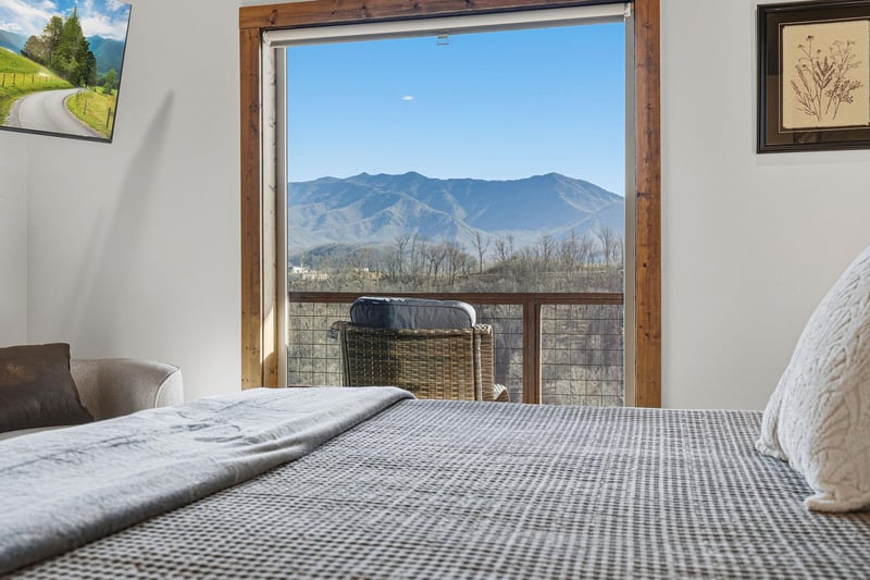 Wake up to breathtaking mountain views through your bedroom window, where majestic peaks create the perfect backdrop for your morning coffee.