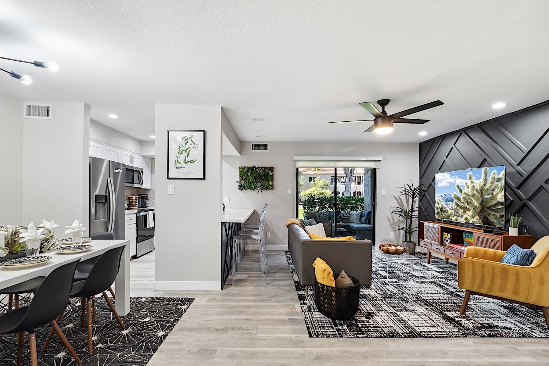 View of the layout Living room, breakfast bar, dining table and kitchen