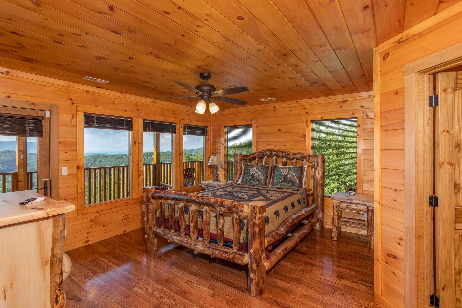 Queen Bedroom with a Log Bed and Deck Access