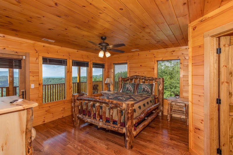 Queen Bedroom with a Log Bed and Deck Access