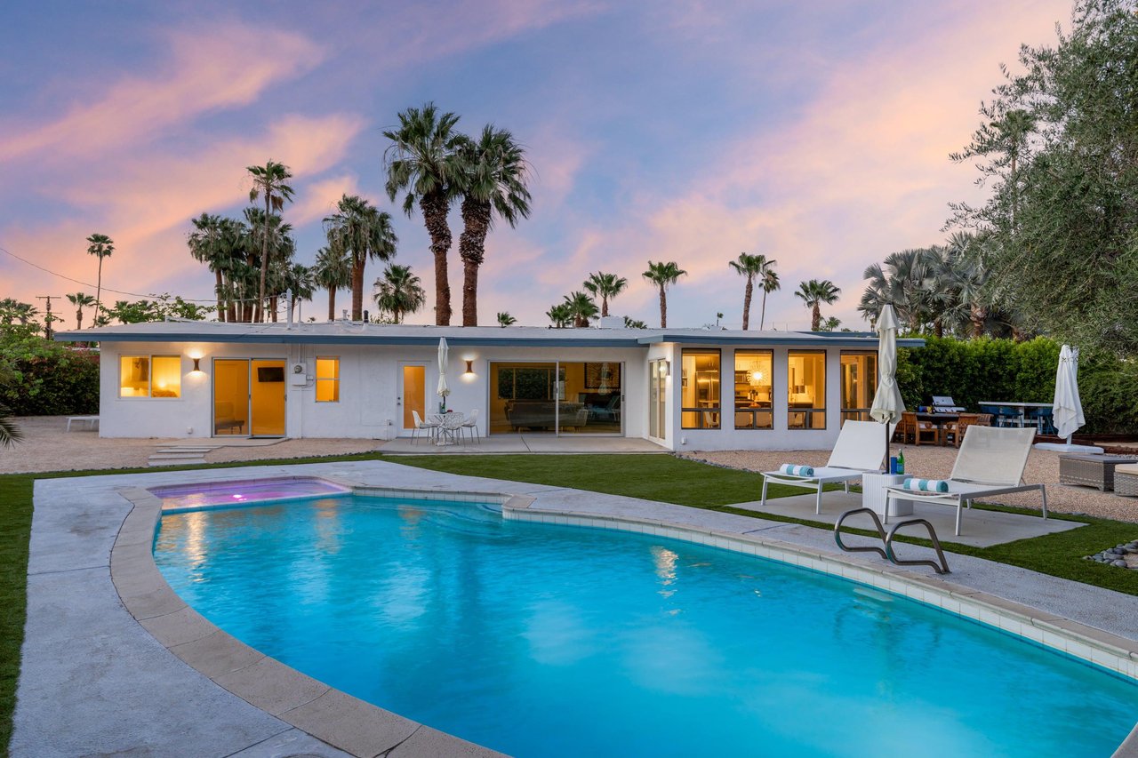 A stunning 3 bedroom, 2 bathroom home in Palm Springs, CA with a private pool, spa, bocce ball, BBQ, and fire pit.