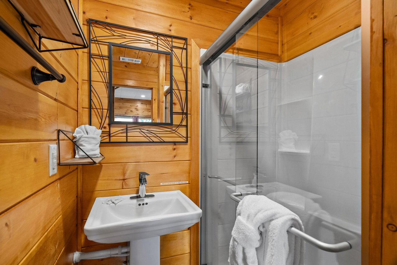 single vanity sink with walk in shower