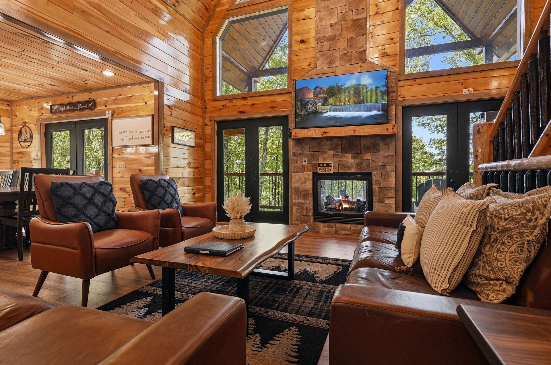 Sink into sumptuous leather seating by your crackling fireplace, where soaring timber ceilings and panoramic windows frame natures beauty perfectly.