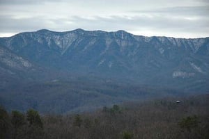 Snow capped mountain tops seen from 5 Star View, a 3 bedroom cabin rental located in Gatlinburg