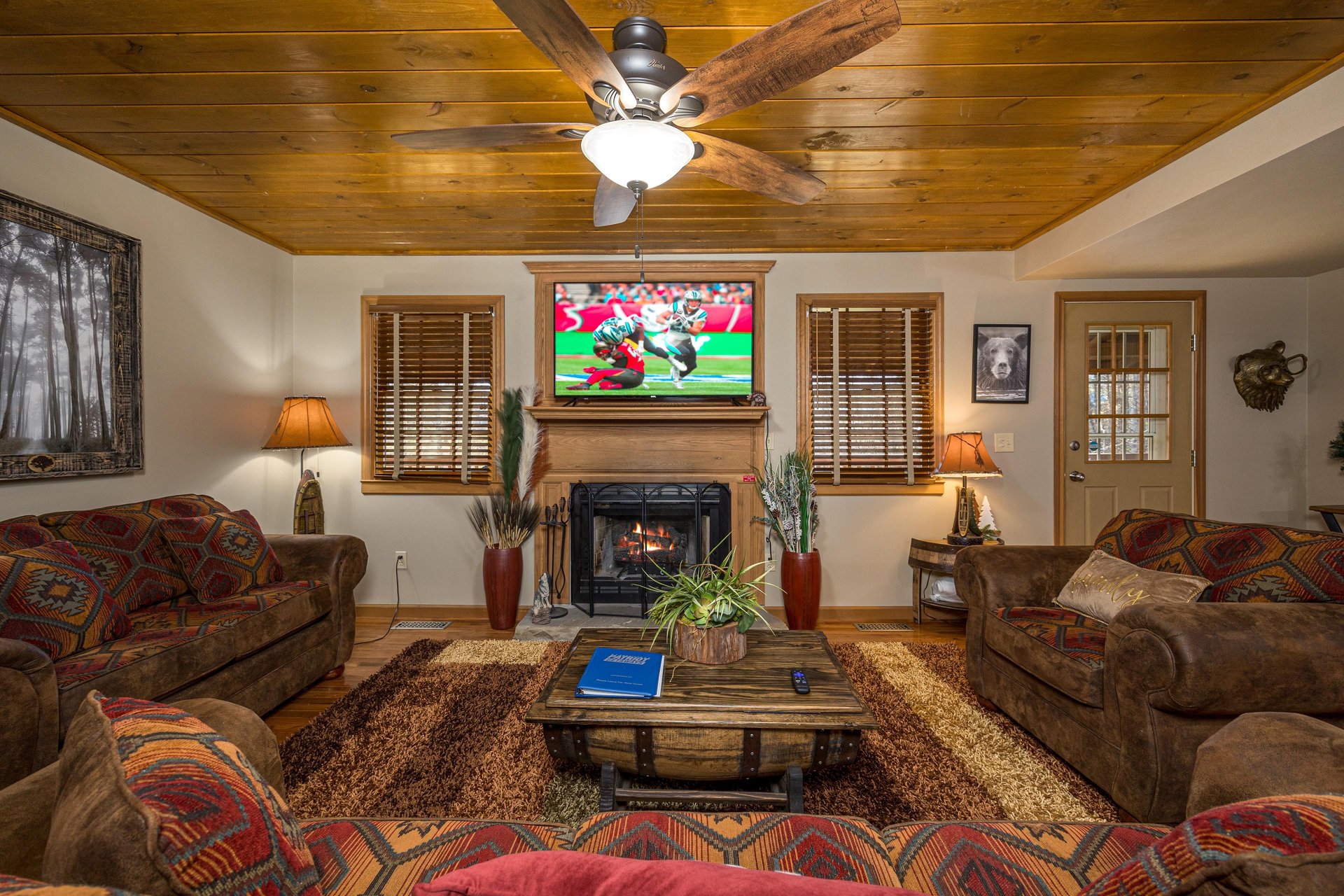 Living room w TV and fireplace