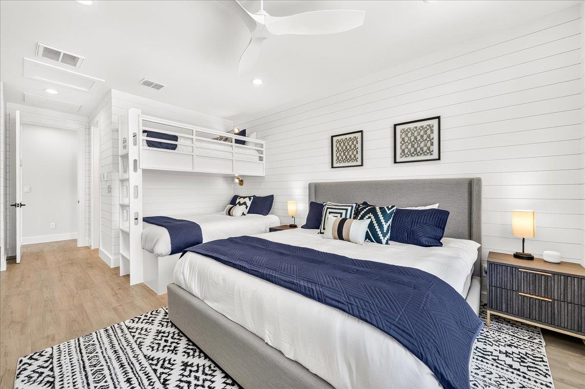 Spacious thirdfloor bunk room features a twinoverqueen bunk bed and a comfortable king bed. The room also includes a private ensuite bathroom.
