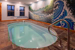 Indoor pool longways at Make A Splash, a 2 bedroom cabin rental located in gatlinburg