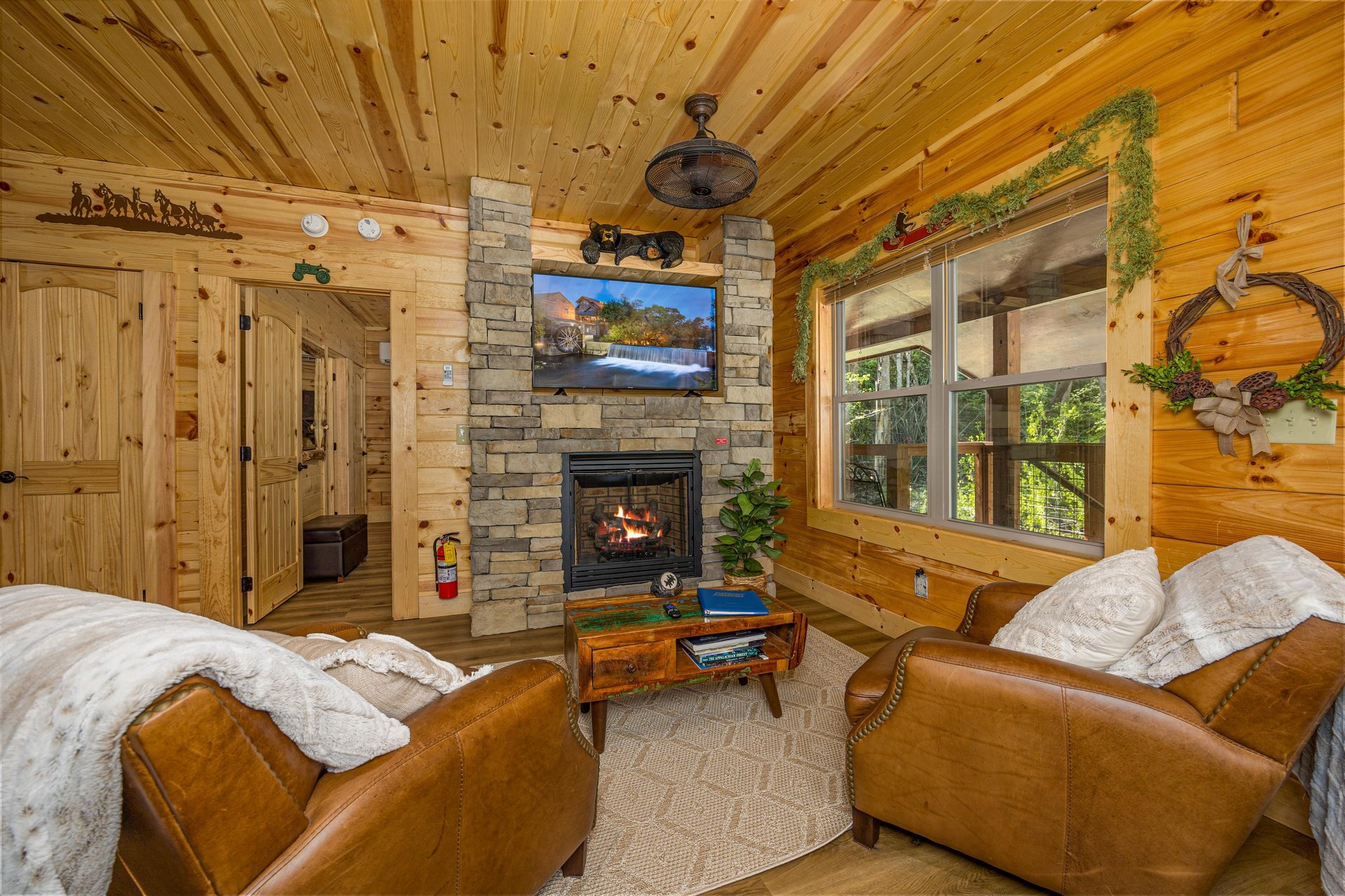 Living room with stone fireplace