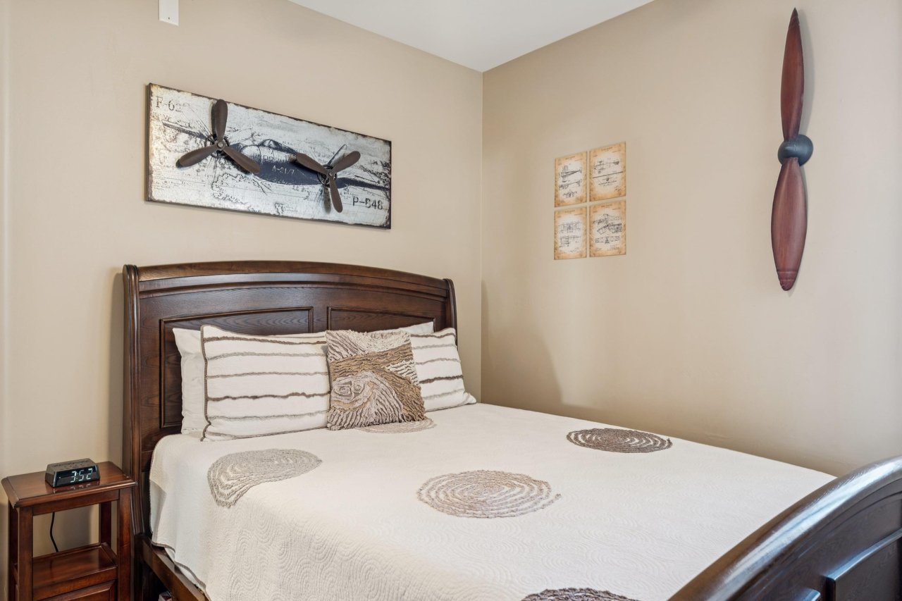 Charming guest bedroom featuring unique aviationinspired décor