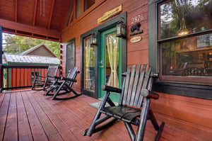 Settle into your private rocker on the covered deck and breathe in the fresh mountain air. This peaceful retreat welcomes you home after exploring.