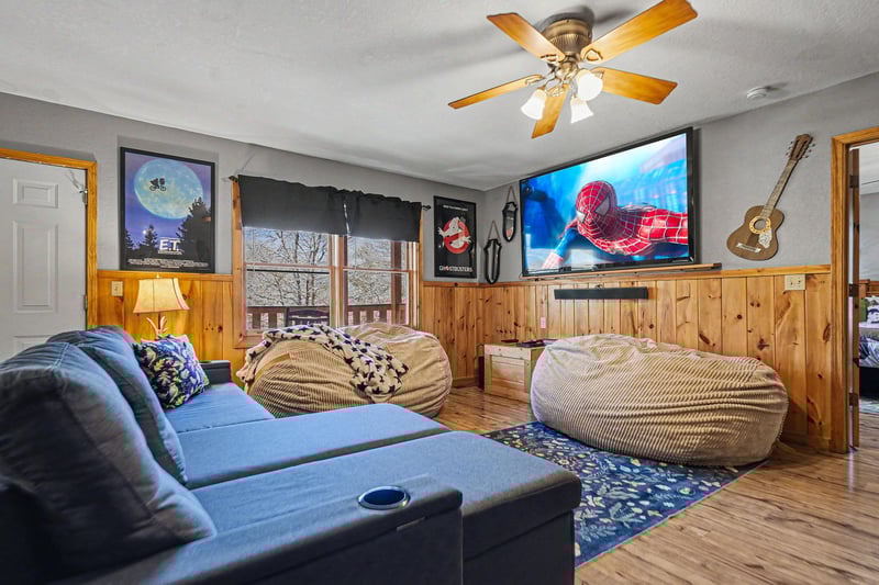 Sink into plush bean bags for your favorite movies on the big screen in this cozy entertainment room.