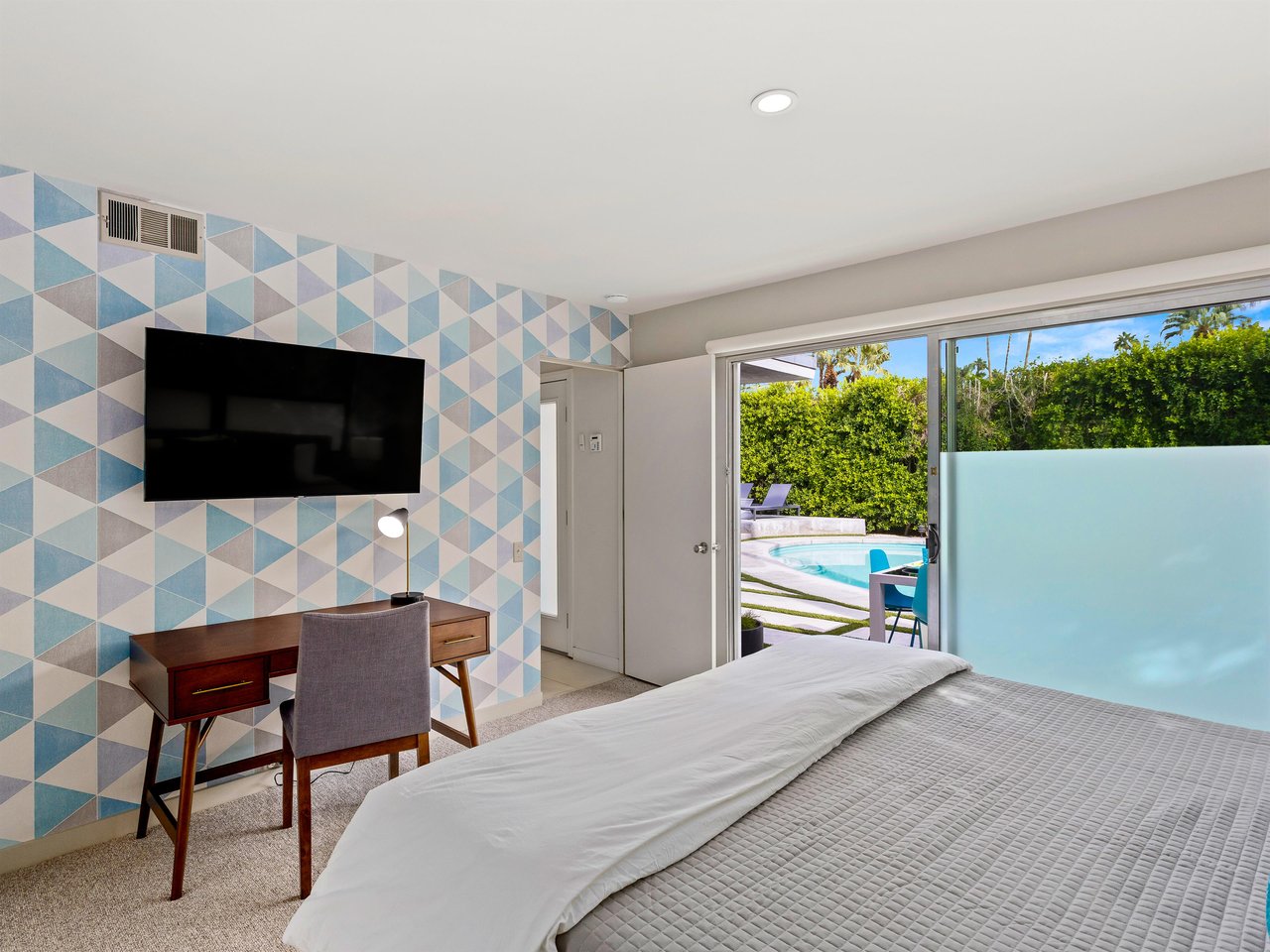 Enjoy access to the outdoors from your beautiful bedroom