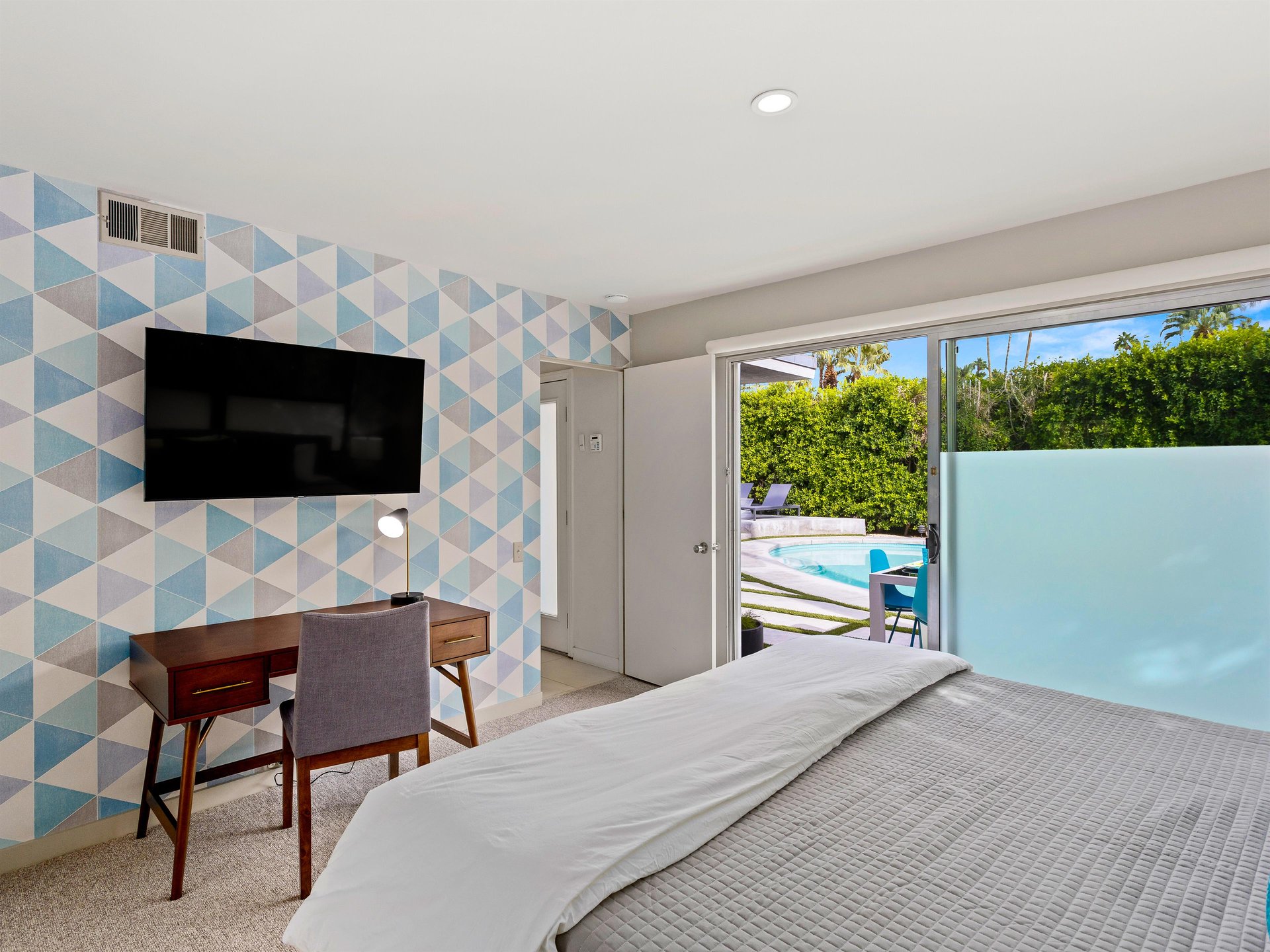 Enjoy access to the outdoors from your beautiful bedroom