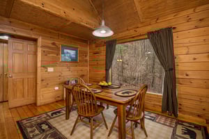 Dining for 4 at Lincoln Logs, a 2 bedroom cabin rental located in Gatlinburg