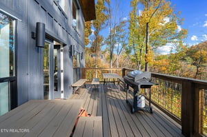 This propertys woodland setting radiates autumn charm, with golden foliage framing the peaceful surroundings throughout the season.